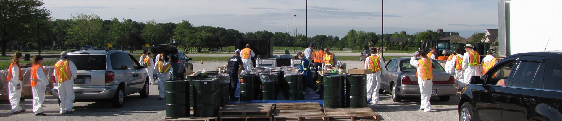 Residents dropping off items at mobile household hazardous waste depot