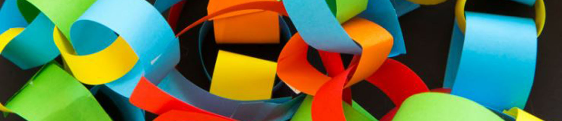 Colourful pile of paper chains