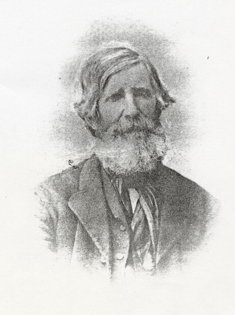 Historic image of an adult white male from the 1800s wearing a formal jacket and shirt.