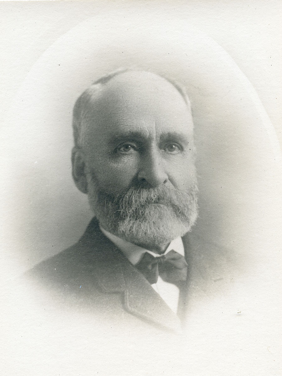 George Proctor Historic image of an adult white male from the early 1900s wearing a formal jacket and shirt.