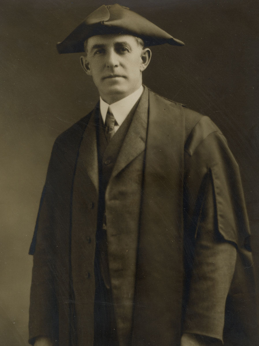 Nicholas Sitter Historic image of an adult white male from the early 1900s wearing a formal jacket and shirt.