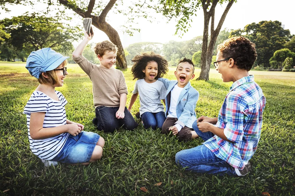 Photo of happy children outside