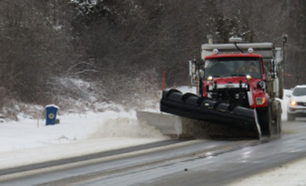 Snowplow on road