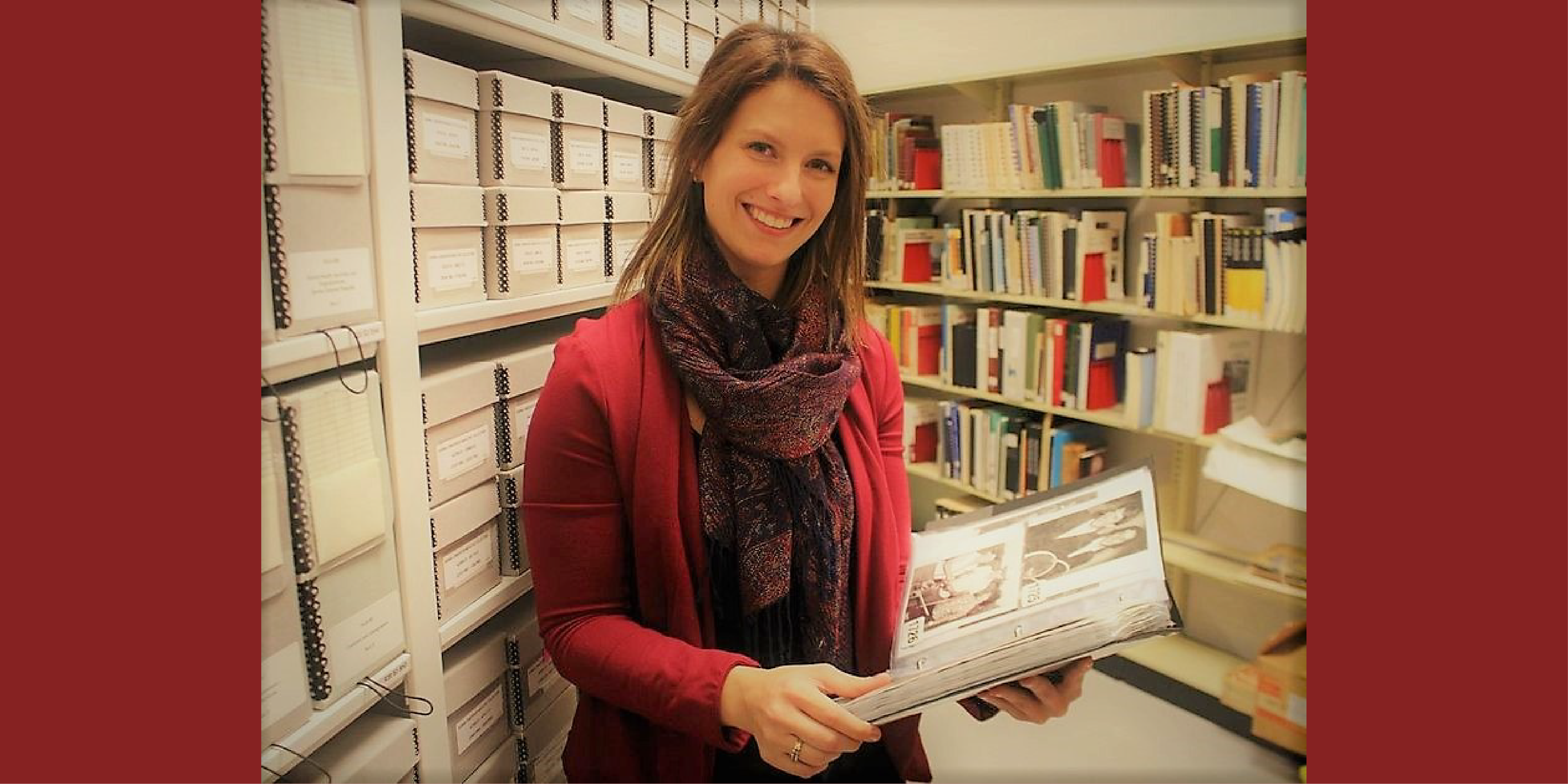 Archivist Nicole Aszalos holds photos in collections storage at Lambton County Archives. Photo by Paul Morden / The Observer