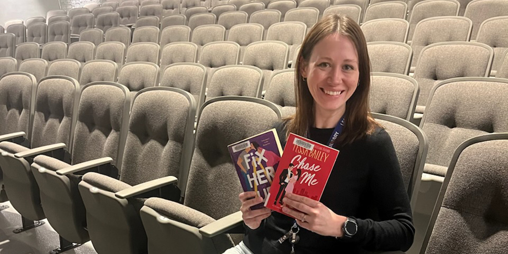 Public Services Coordinator - Adult Programs & Outreach Adrianne Lebert poses in the Sarnia Library Theatre