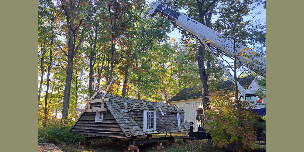 Canatara Cabin roof being moved by crane onto specially built frame