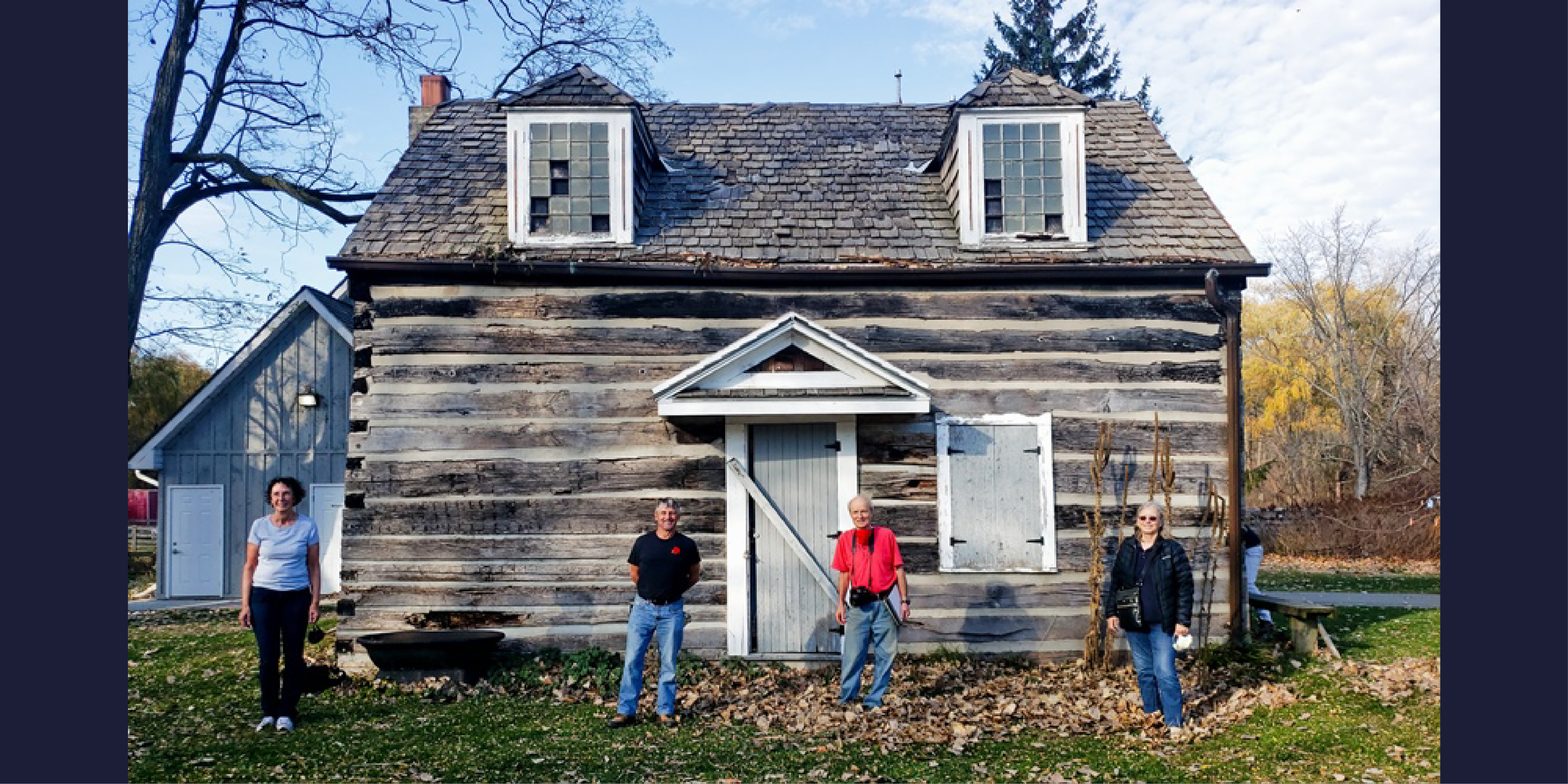 Volunteers standing in front of the cabin at Canatara Park