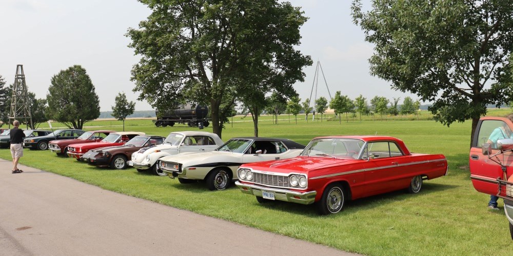 Classic cars parked at the Oil Museum in July 2023