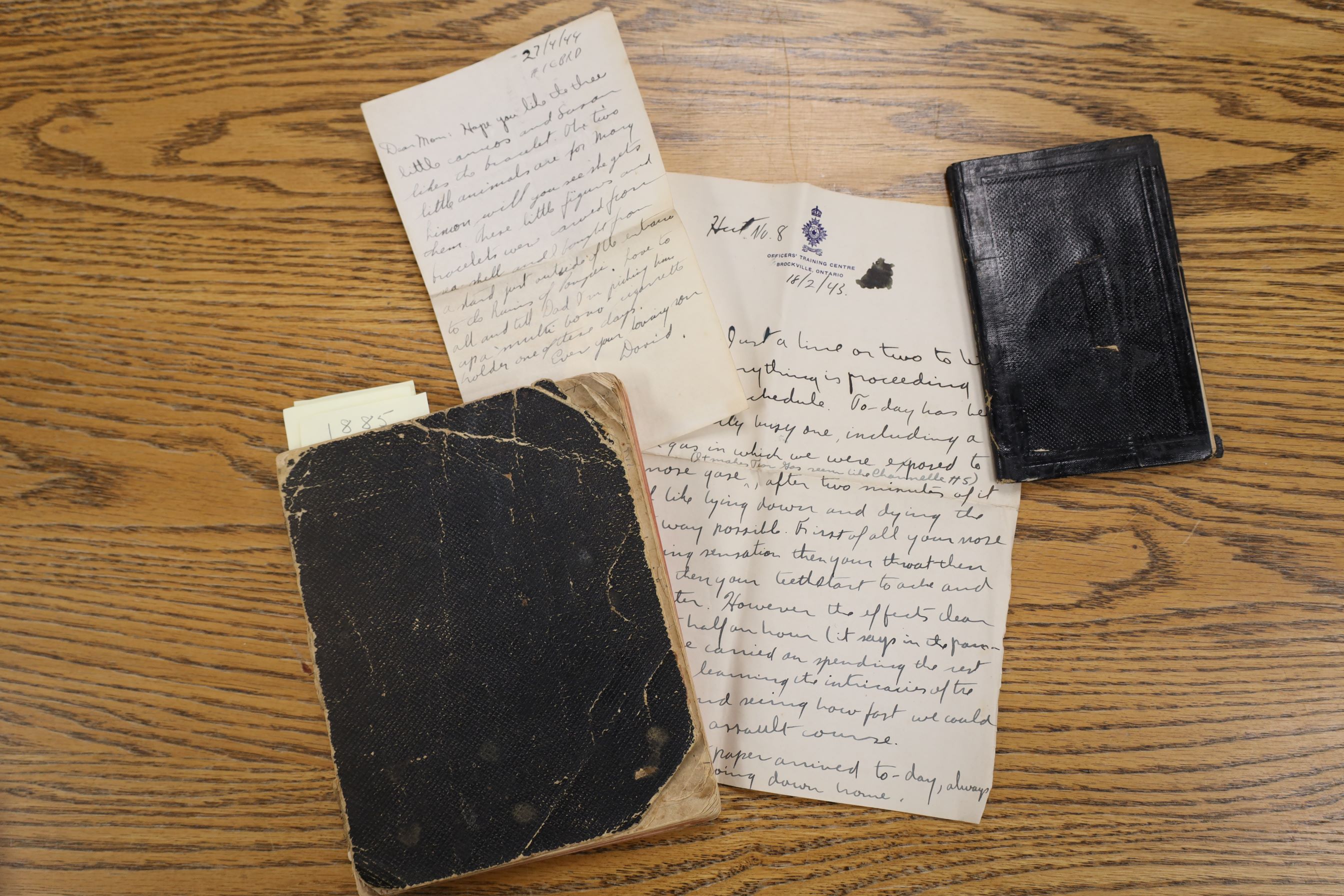 Diaries and letters from Lambton County Archives’ collection sitting on a wooden table