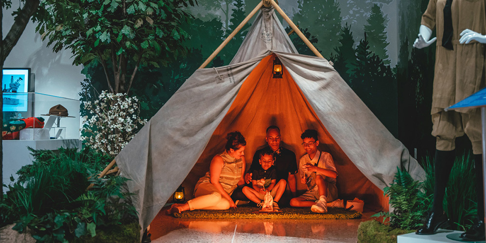 A family explores the interactive tent in the new Lambton Gallery