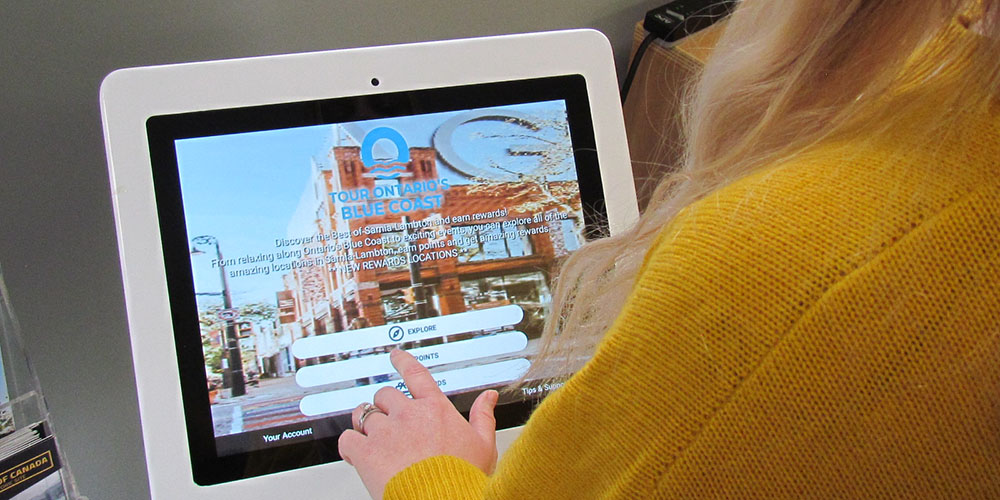 Touch-screen tourism kiosk in a Lambton County Library location