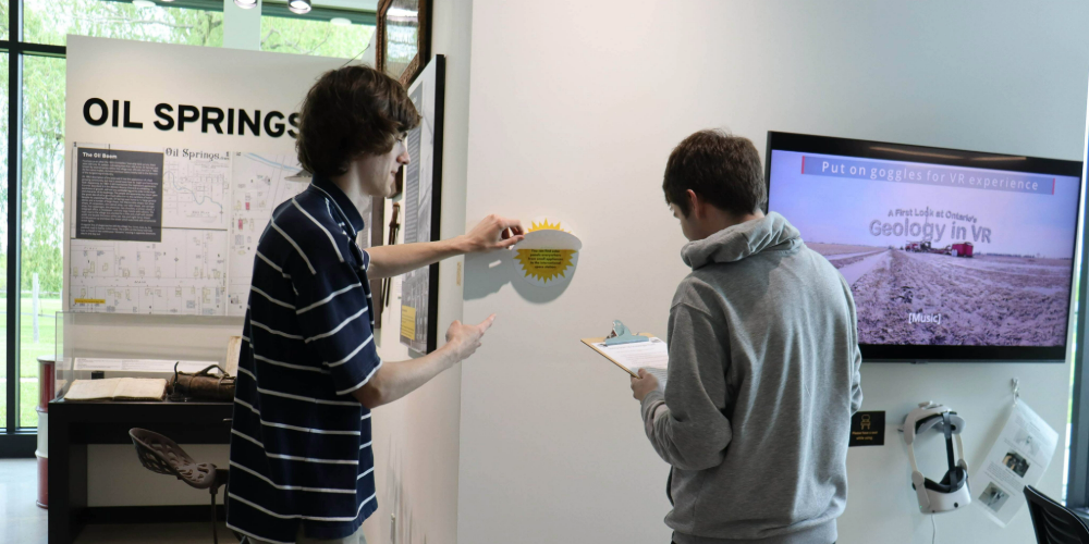 Staff prepare the solar scavenger hunt for the Sunny Side Up PA Day event.