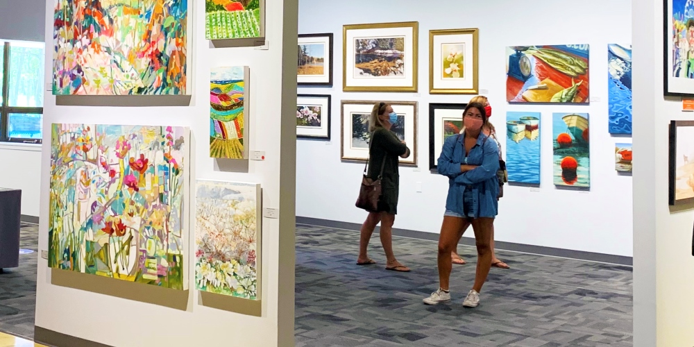 Paint Ontario patrons wearing masks while viewing exhibit