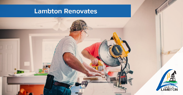 Man using saw while renovating house