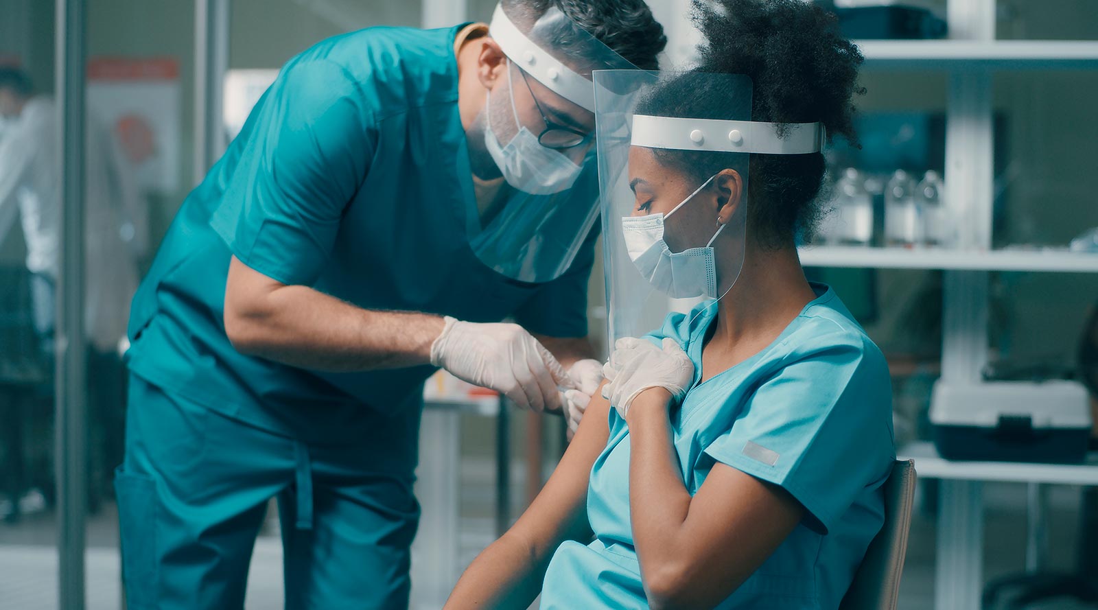 Healthcare worker receives vaccination