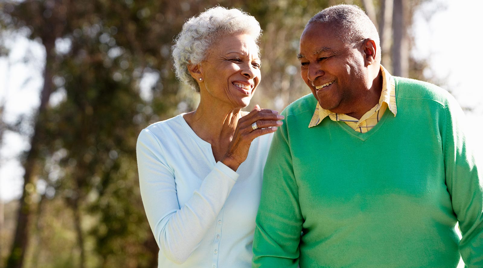 senior couple walking outdoors